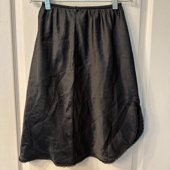 Warners | VTG Black Satin Slip Skirt Lace Trim Slit Small 55317 Fairy Goth - Picture 1 of 9